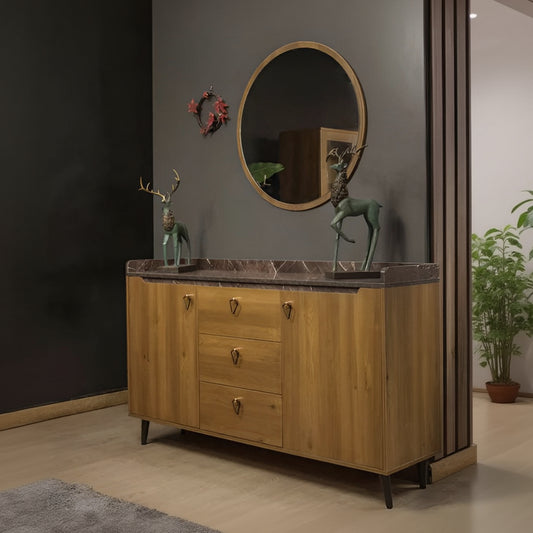 Wooden sideboard with marble top in a room setting